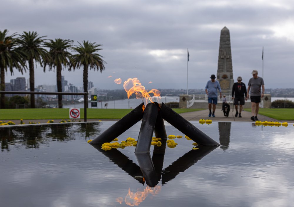 The State War Memorial and a flame