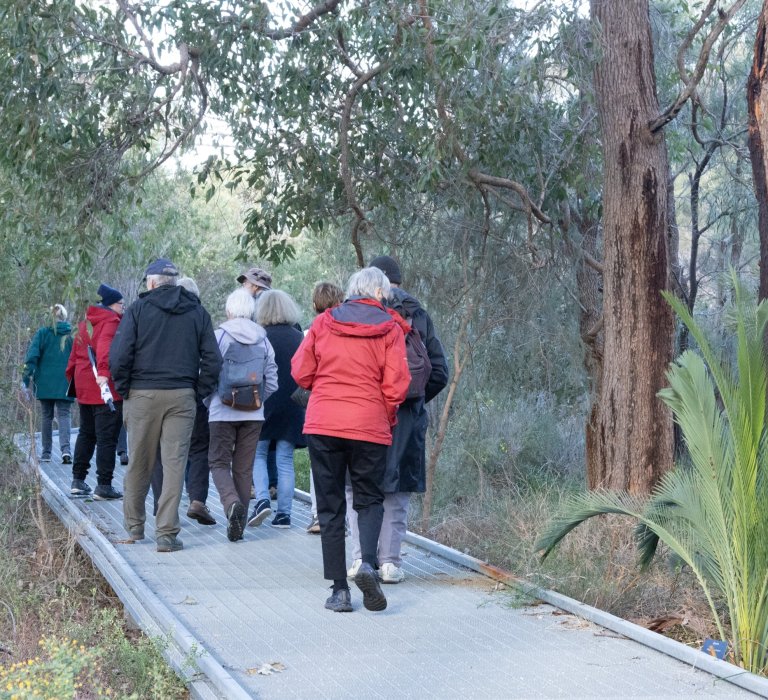 Guests on nature trail walk